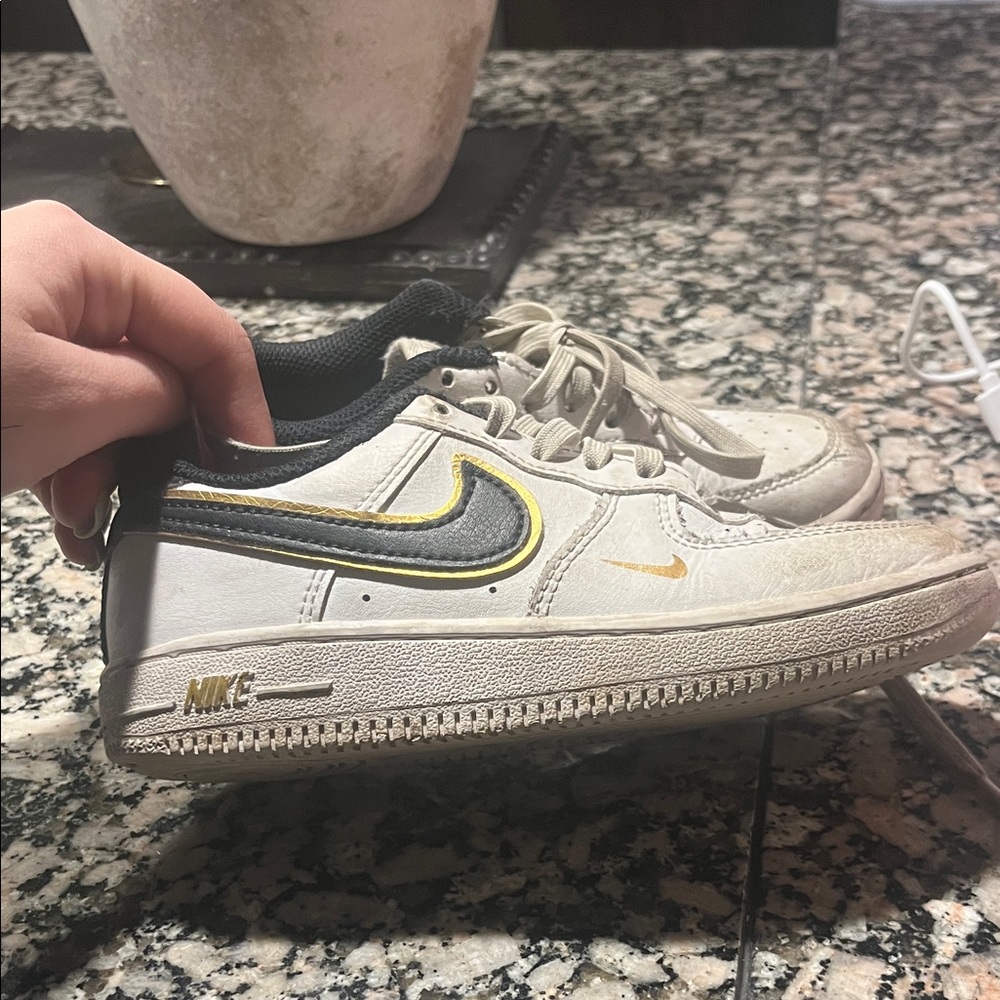 Nike White and Black Shoes with Gold Details